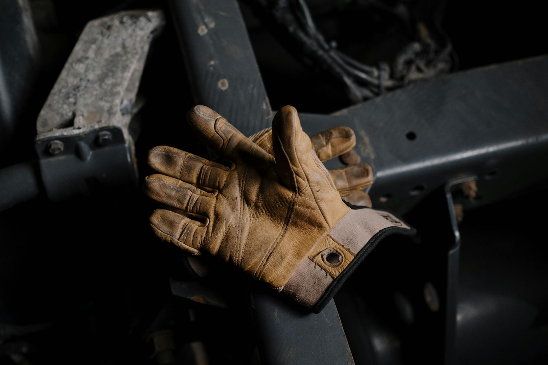 close up photograph of brown gloves